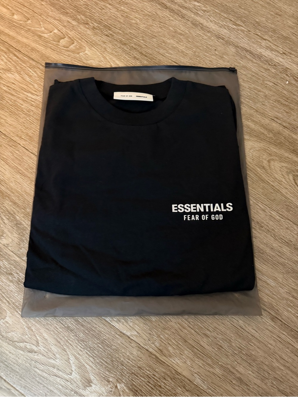 Fear of God Essentials Black T-Shirt with White Chest Logo Medium